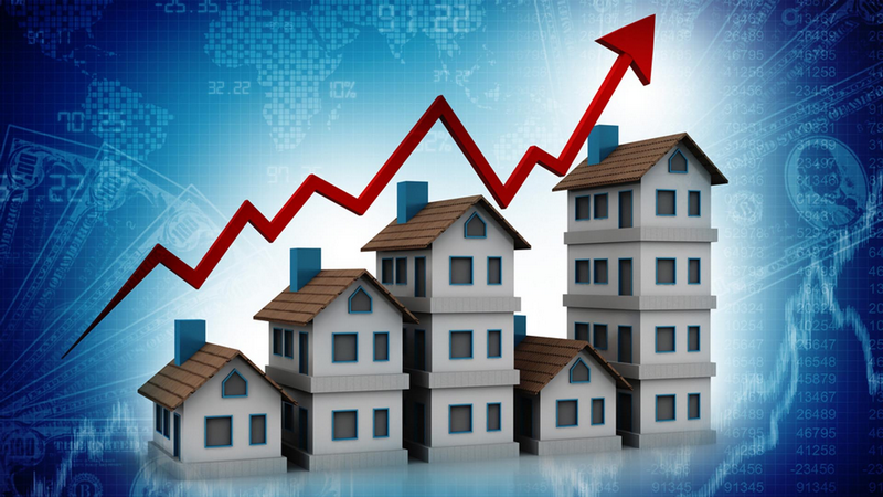 An upward red arrow above a group of houses represents growth or increase in the real estate market.